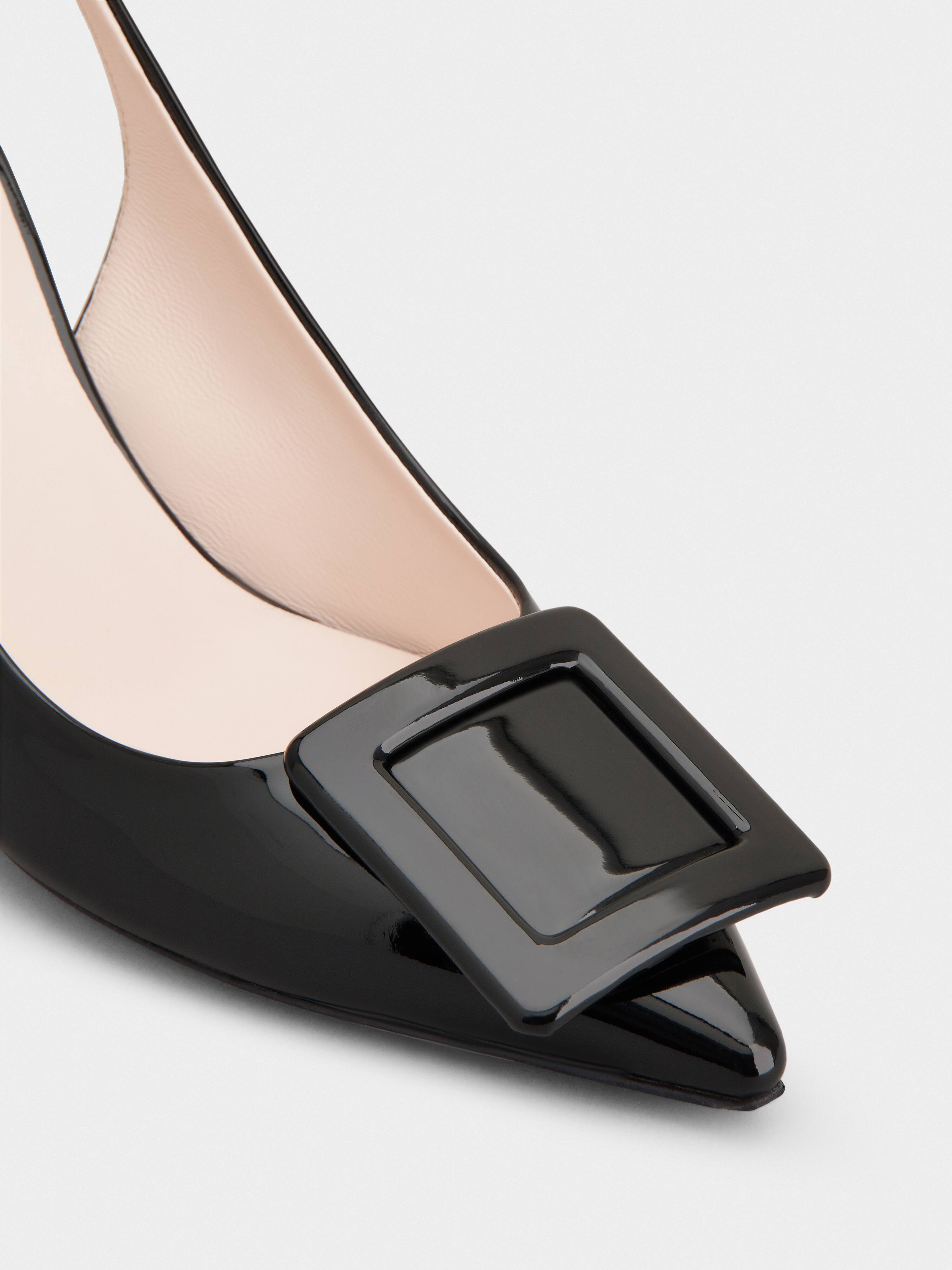 black patent leather wedge pumps